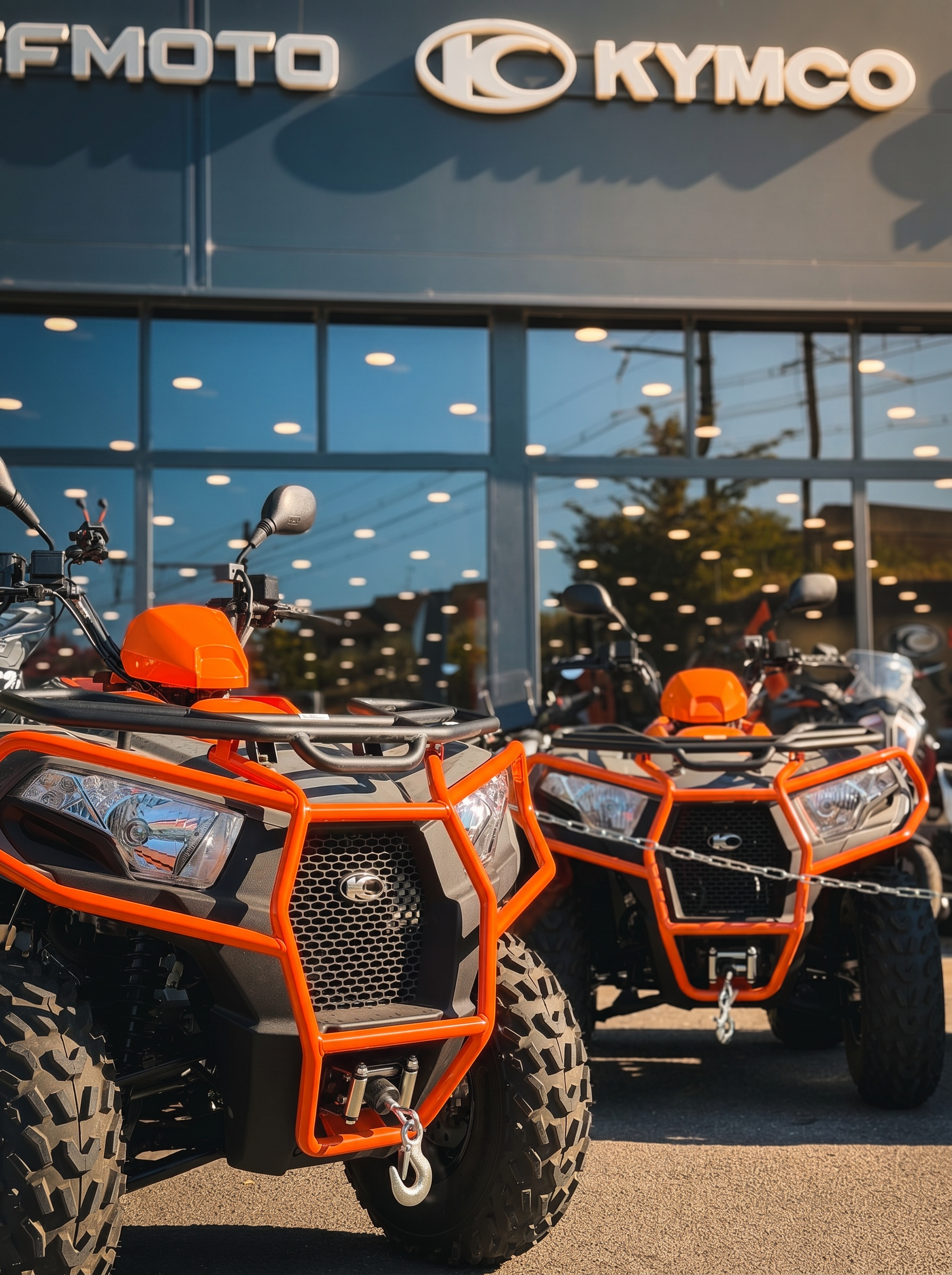 Flotte de quads MyQuad alignés, reflets de fin de journée